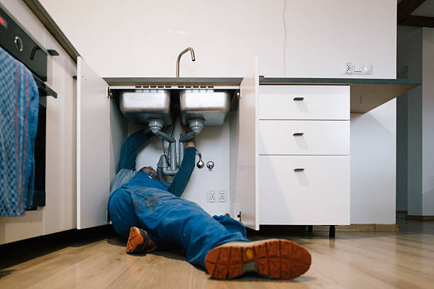 Professional Emergency Plumber technician working in Lakeshore, FL